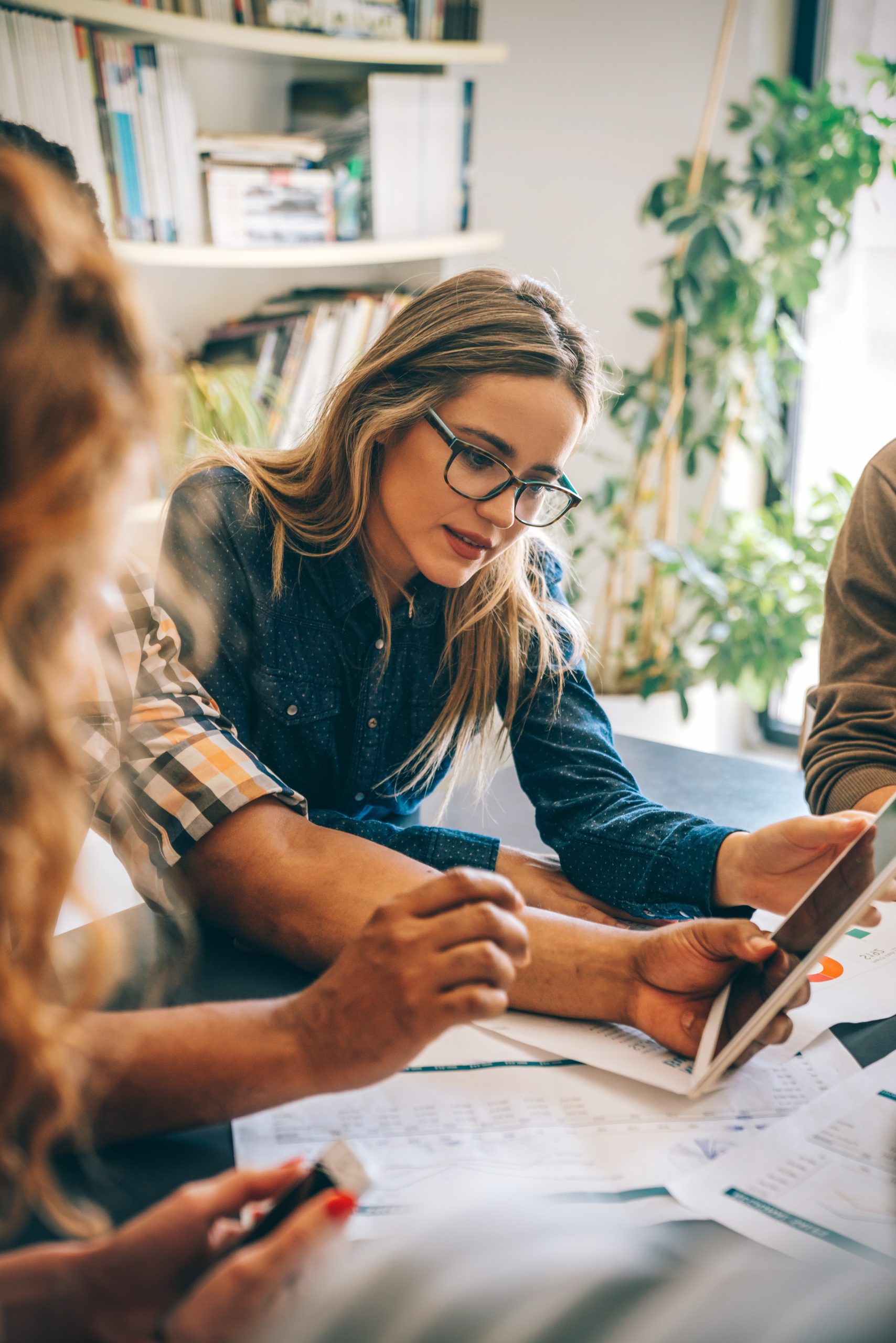 Team collaborating on hiring strategy in a modern SaaS office